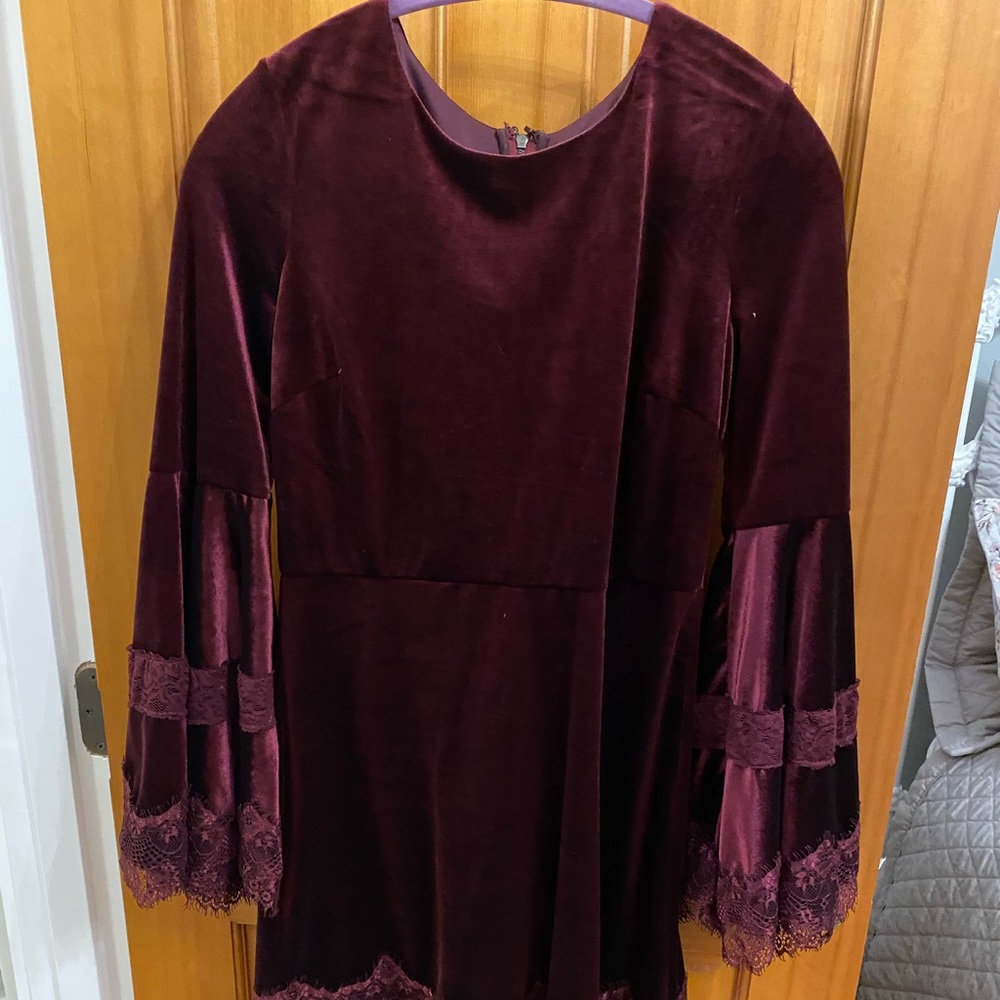 Burgundy velvet dress with bell sleeves